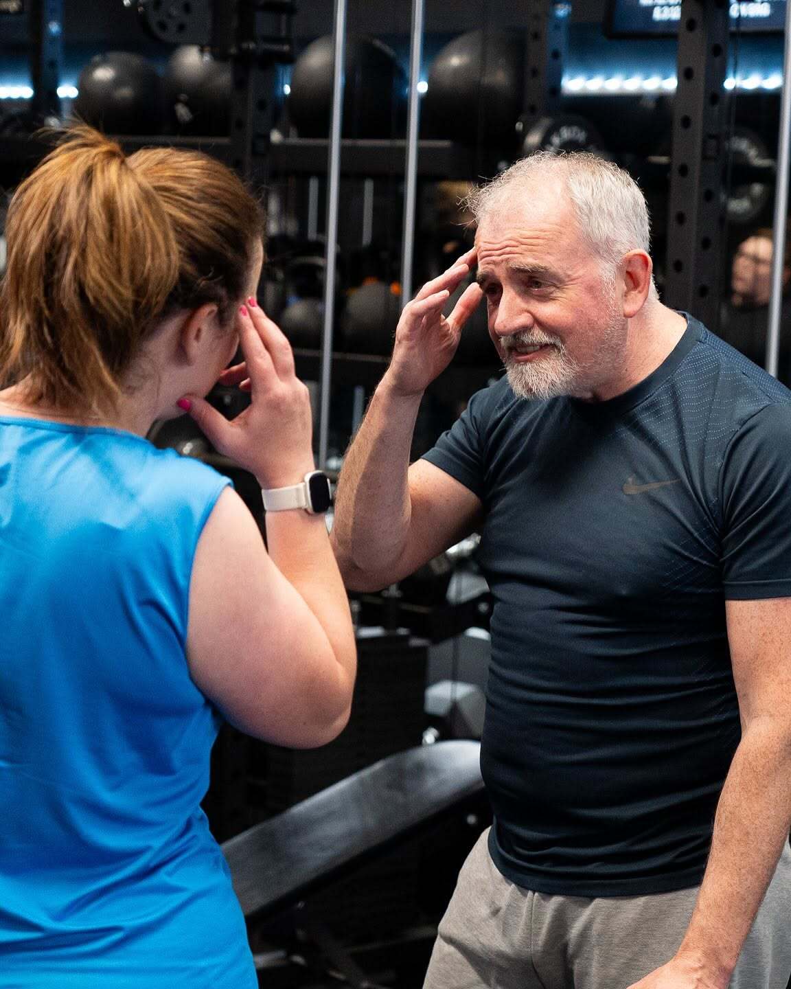Coach working with member